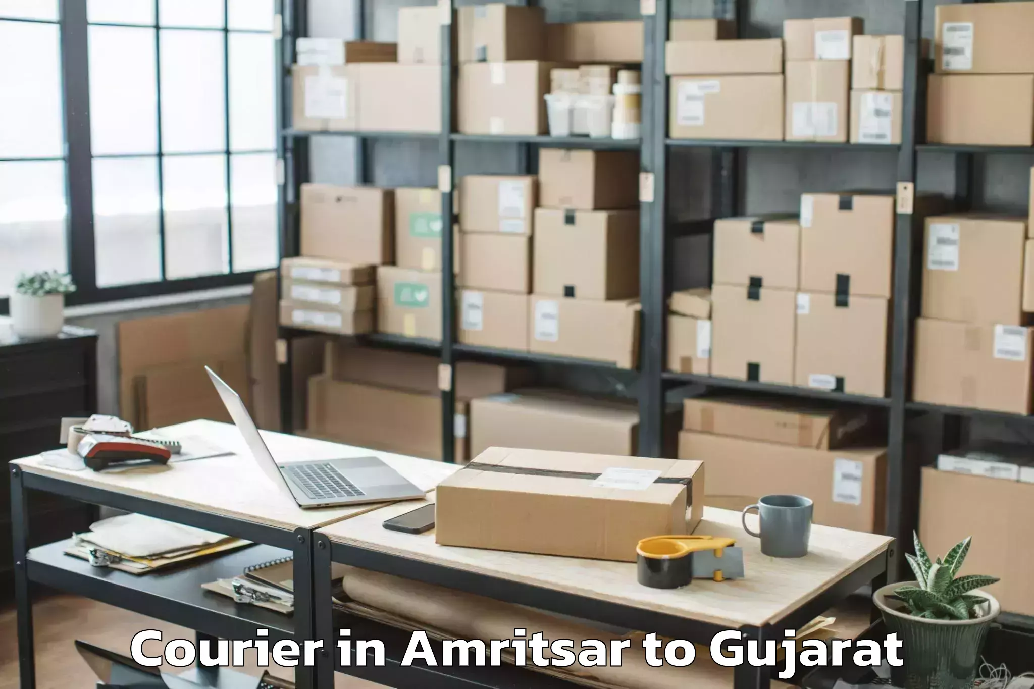 Top Amritsar to Khambhalia Courier Available